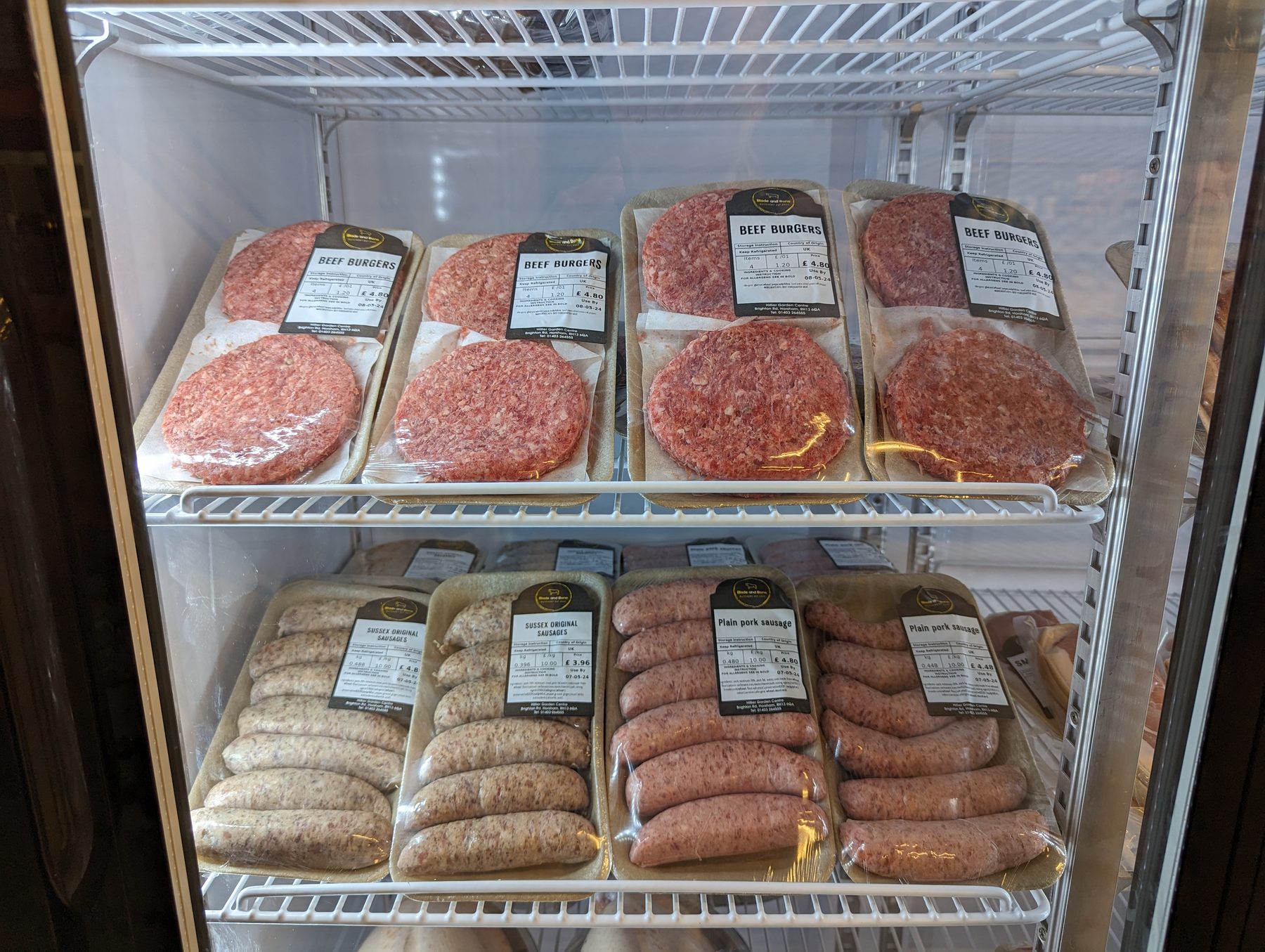 Blade and Bone beef burgers and sausages in the shop fridge